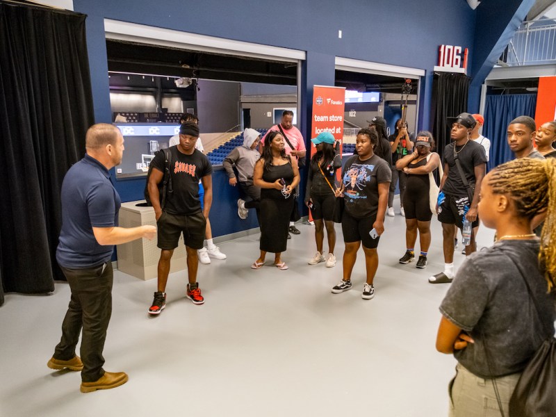 Howard University's Summer Sports Management Camp participants tour the Entertainment & Sports Arena. The one-week camp was designed to expose DCPS students to careers in sport management. (Ja'Mon Jackson/The Washington Informer)